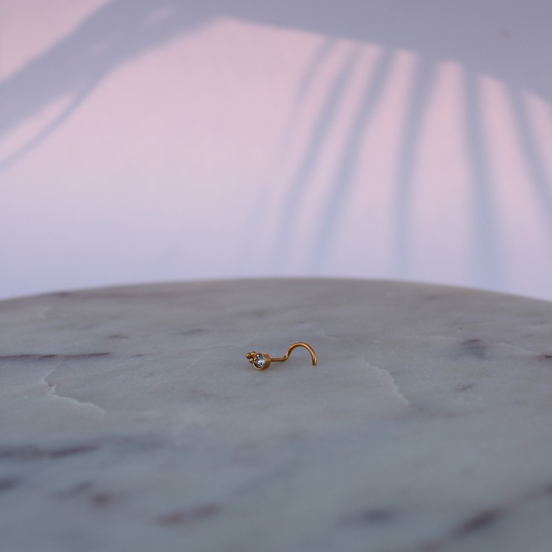 Piercing nez tire-bouchon zircon